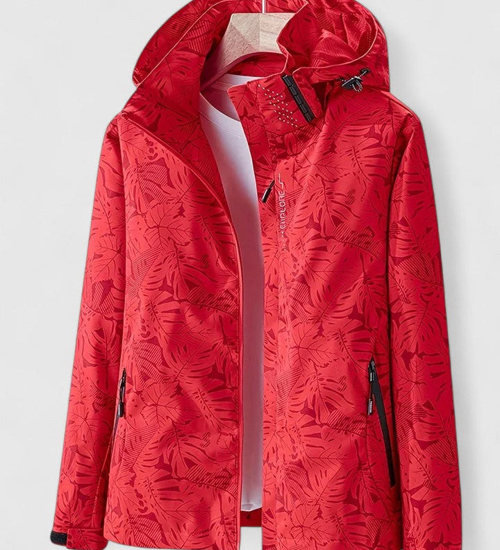 Tjaša – Elegantna vetrovka z botaničnim vzorcem