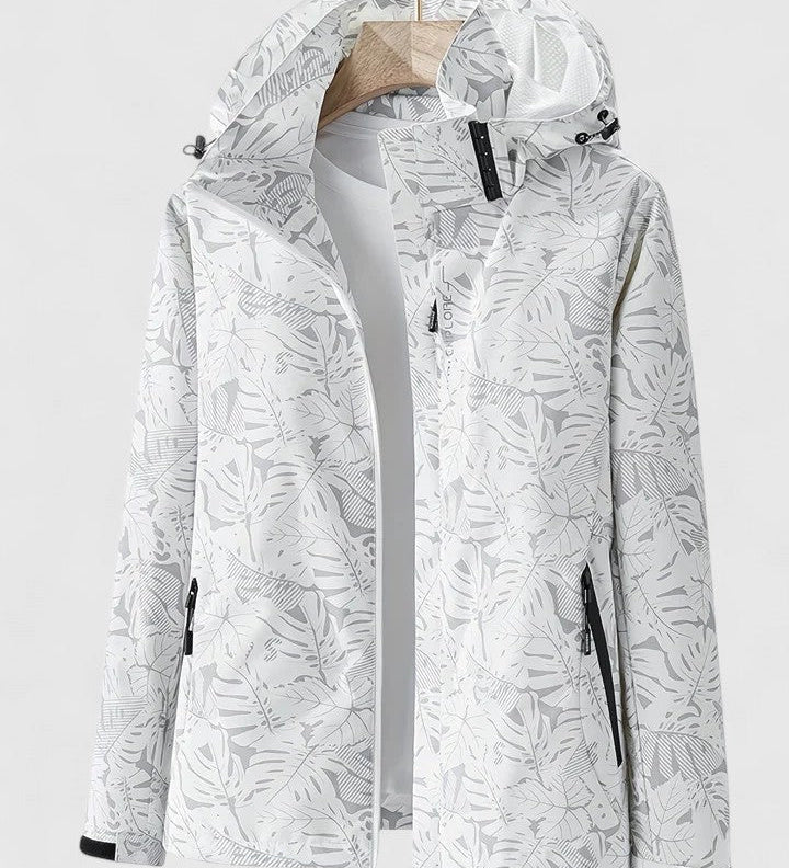 Tjaša – Elegantna vetrovka z botaničnim vzorcem